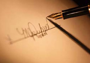 Disclaimer: showing a pen signing a signature which is blured